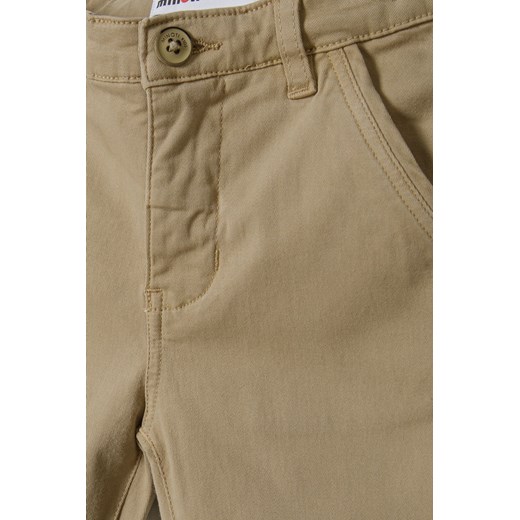 Jasnobrązowe spodnie typu chinosy chłopięce Minoti 128/134 promocja 5.10.15