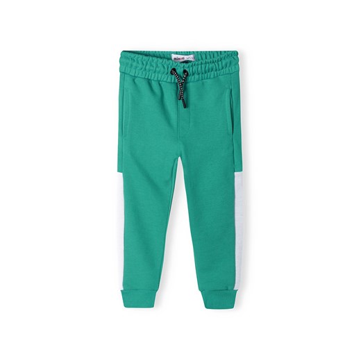 Zielone spodnie dresowe niemowlęce z białymi paskami Minoti 92/98 5.10.15