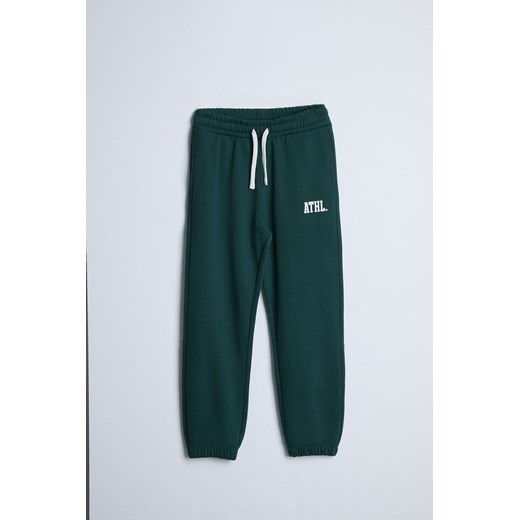 Zielone spodnie dresowe ATHL.- Limited Edition ze sklepu 5.10.15 w kategorii Spodnie chłopięce - zdjęcie 169713984