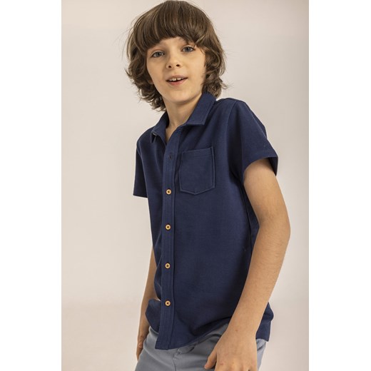 Koszula chłopięca z krótkim rękawem granatowa ze sklepu 5.10.15 w kategorii Koszule chłopięce - zdjęcie 169716061
