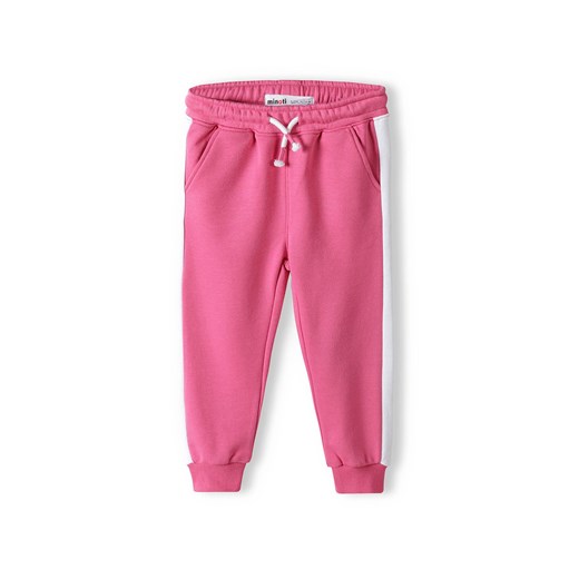 Ciemnoróżowe spodnie dresowe dziewczęce z paskami ze sklepu 5.10.15 w kategorii Spodnie dziewczęce - zdjęcie 169717593