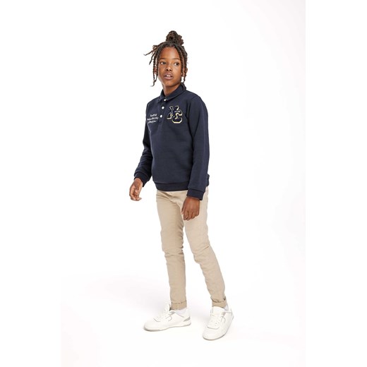 Granatowa bluzka polo z długim rękawem dla chłopca ze sklepu 5.10.15 w kategorii Bluzy chłopięce - zdjęcie 169719620