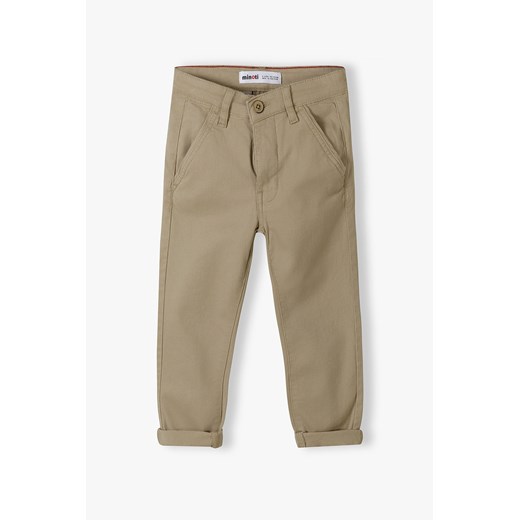 Beżowe spodnie chłopięce typu chinosy z bawełny ze sklepu 5.10.15 w kategorii Spodnie chłopięce - zdjęcie 169719753