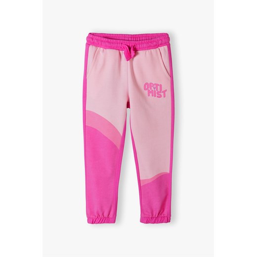 Spodnie dresowe dla dziewczynki OPTIMIST - różowe ze sklepu 5.10.15 w kategorii Spodnie dziewczęce - zdjęcie 169726773