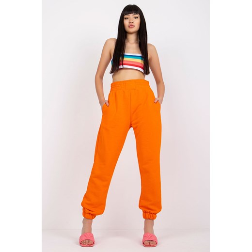 Pomarańczowe spodnie dresowe z kieszeniami RUE PARIS ze sklepu 5.10.15 w kategorii Spodnie damskie - zdjęcie 169728460