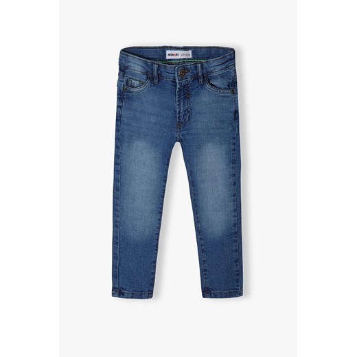 Ciemnoniebieskie spodnie jeansowe niemowlęce skinny ze sklepu 5.10.15 w kategorii Spodnie i półśpiochy - zdjęcie 169730852