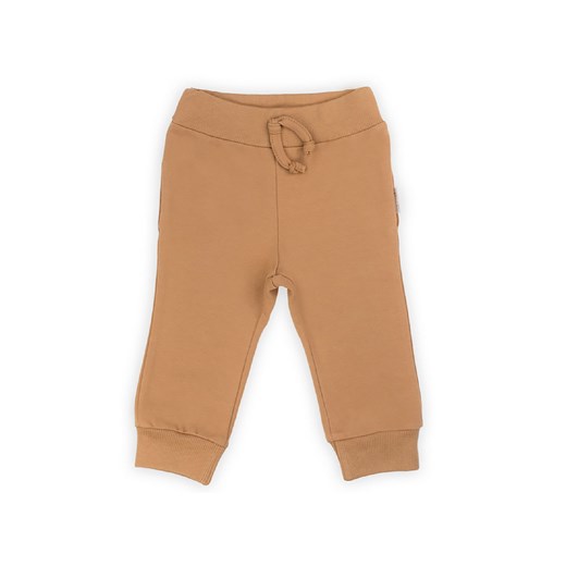 Beżowe spodnie dresowe z bawełny dla chłopca ze sklepu 5.10.15 w kategorii Spodnie chłopięce - zdjęcie 169731622