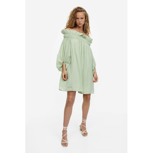 Sukienka H & M oversize zielona z długimi rękawami 