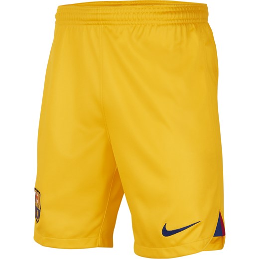 Spodenki piłkarskie dla dużych dzieci Nike Dri-FIT FC Barcelona Stadium 2023/24 (wersja czwarta) - Żółty ze sklepu Nike poland w kategorii Spodenki męskie - zdjęcie 169754971