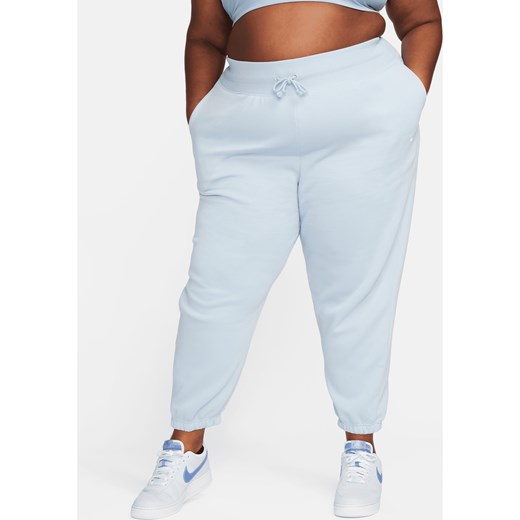 Damskie spodnie dresowe o kroju oversize z wysokim stanem Nike Sportswear Phoenix Fleece (duże rozmiary) - Niebieski ze sklepu Nike poland w kategorii Spodnie damskie - zdjęcie 169755042