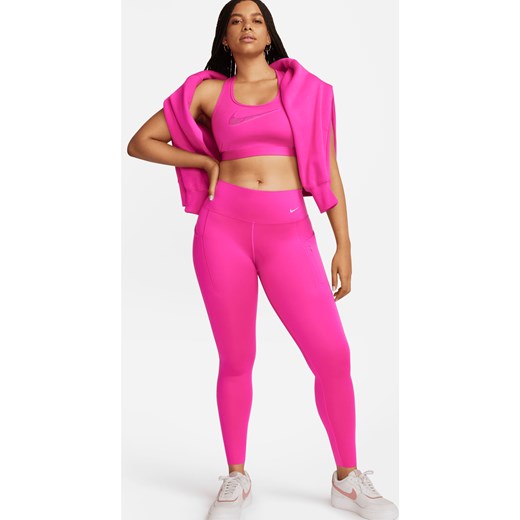 Damskie legginsy o pełnej długości ze średnim stanem i kieszeniami zapewniające mocne wsparcie Nike Go - Różowy ze sklepu Nike poland w kategorii Spodnie damskie - zdjęcie 169755231