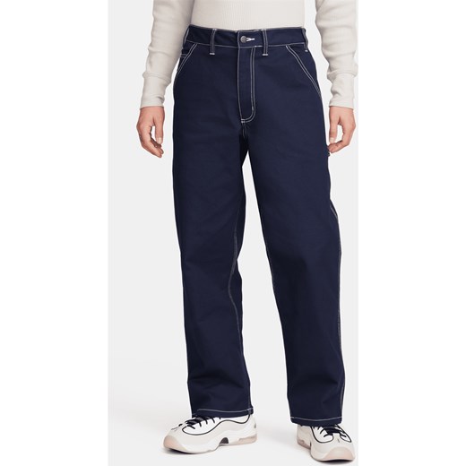Męskie spodnie typu carpenter Nike Life - Niebieski ze sklepu Nike poland w kategorii Spodnie męskie - zdjęcie 169755744