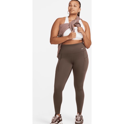 Damskie legginsy o pełnej długości z wysokim stanem i kieszeniami zapewniające mocne wsparcie Nike Go - Brązowy ze sklepu Nike poland w kategorii Spodnie damskie - zdjęcie 169756080