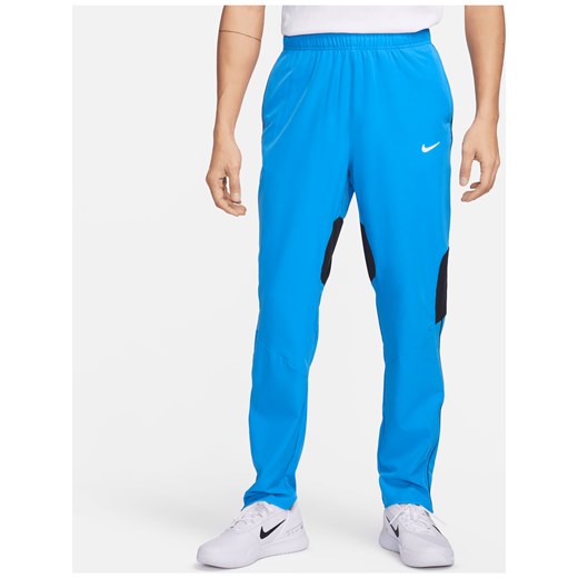 Męskie spodnie do tenisa Dri-FIT NikeCourt Advantage - Niebieski ze sklepu Nike poland w kategorii Spodnie męskie - zdjęcie 169756440
