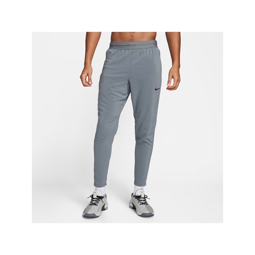 Męskie spodnie do fitnessu Dri-FIT Nike Flex Rep - Szary ze sklepu Nike poland w kategorii Spodnie męskie - zdjęcie 169756604
