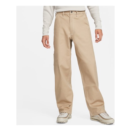 Męskie spodnie typu carpenter Nike Life - Brązowy ze sklepu Nike poland w kategorii Spodnie męskie - zdjęcie 169756720