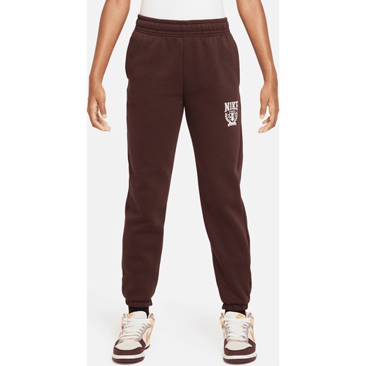Dzianinowe spodnie o kroju oversize dla dużych dzieci (dziewcząt) Nike Sportswear - Brązowy ze sklepu Nike poland w kategorii Spodnie dziewczęce - zdjęcie 169756872