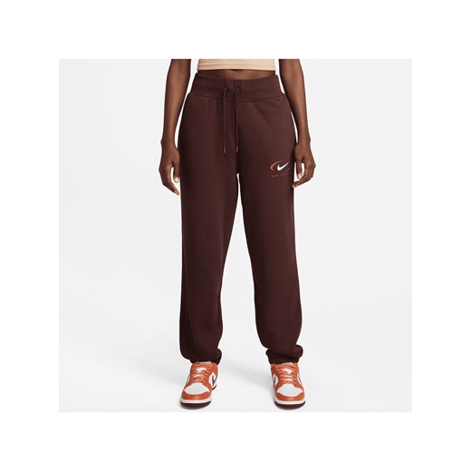 Damskie spodnie o kroju oversize z wysokim stanem Nike Sportswear Phoenix Fleece - Brązowy ze sklepu Nike poland w kategorii Spodnie damskie - zdjęcie 169757352