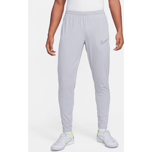 Męskie spodnie piłkarskie Dri-FIT Nike Academy - Szary ze sklepu Nike poland w kategorii Spodnie męskie - zdjęcie 169757434