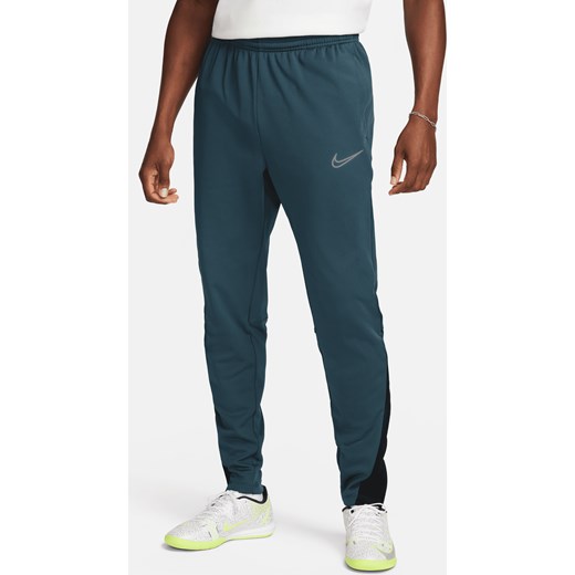 Męskie spodnie piłkarskie Therma-FIT Nike Academy Winter Warrior - Zieleń Nike XS promocyjna cena Nike poland