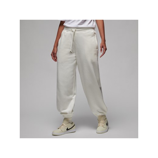 Damskie spodnie zimowe Jordan Flight Fleece - Biel ze sklepu Nike poland w kategorii Spodnie damskie - zdjęcie 169757714
