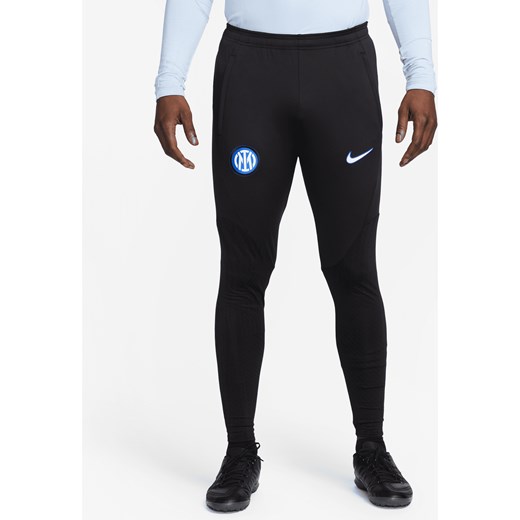 Męskie dzianinowe spodnie piłkarskie Inter Mediolan Strike Nike Dri-FIT - Czerń ze sklepu Nike poland w kategorii Spodnie męskie - zdjęcie 169757931