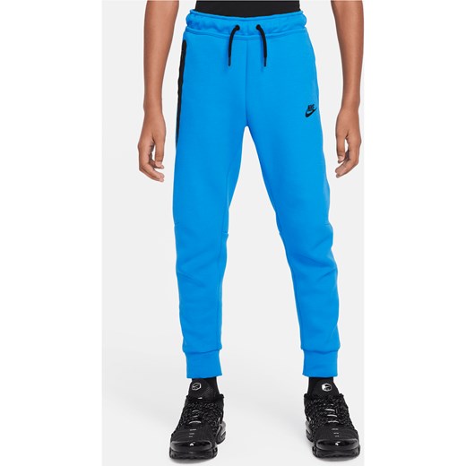 Spodnie dla dużych dzieci (chłopców) Nike Sportswear Tech Fleece - Niebieski ze sklepu Nike poland w kategorii Spodnie chłopięce - zdjęcie 169758343