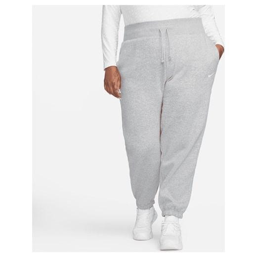 Damskie spodnie dresowe o kroju oversize z wysokim stanem Nike Sportswear Phoenix Fleece (duże rozmiary) - Szary ze sklepu Nike poland w kategorii Spodnie damskie - zdjęcie 169758351