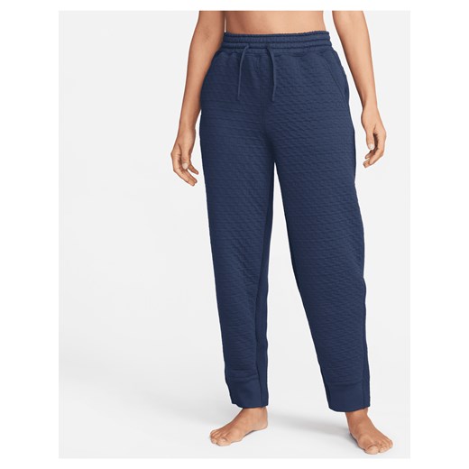 Damskie spodnie o kroju oversize z wysokim stanem Nike Yoga Therma-FIT - Niebieski ze sklepu Nike poland w kategorii Spodnie damskie - zdjęcie 169758410