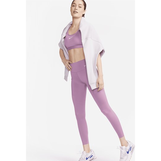 Damskie legginsy ze średnim stanem i kieszeniami o długości 7/8 zapewniające mocne wsparcie Nike Go - Fiolet ze sklepu Nike poland w kategorii Spodnie damskie - zdjęcie 169758453