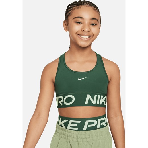 Dziewczęcy stanik sportowy Nike Pro Swoosh - Zieleń ze sklepu Nike poland w kategorii Staniki dla dziewczynki - zdjęcie 169759362
