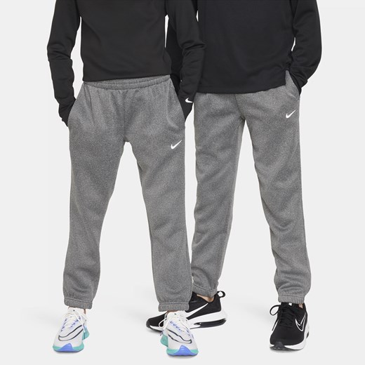 Spodnie zimowe dla dużych dzieci Nike Therma-FIT - Czerń Nike M Nike poland