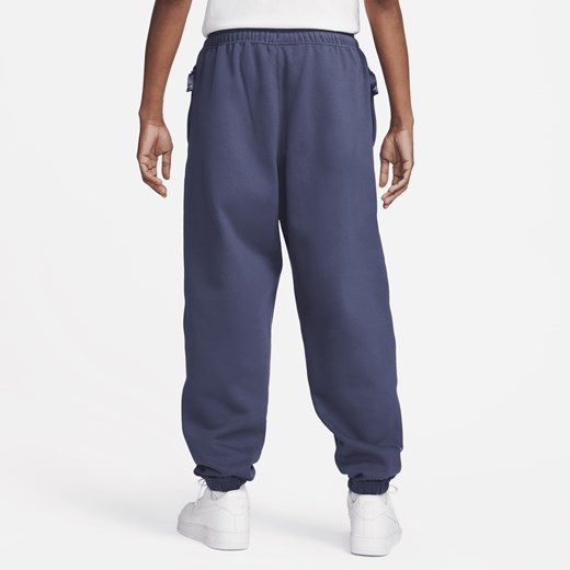 Męskie spodnie z dzianiny Nike Solo Swoosh - Niebieski Nike M Nike poland