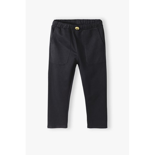 Czarne proste spodnie dresowe dla dziecka ze sklepu 5.10.15 w kategorii Spodnie chłopięce - zdjęcie 169816091