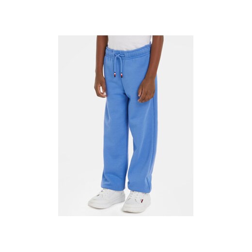 Tommy Hilfiger Spodnie dresowe Logo KB0KB08838 Niebieski Relaxed Fit ze sklepu MODIVO w kategorii Spodnie chłopięce - zdjęcie 169842670