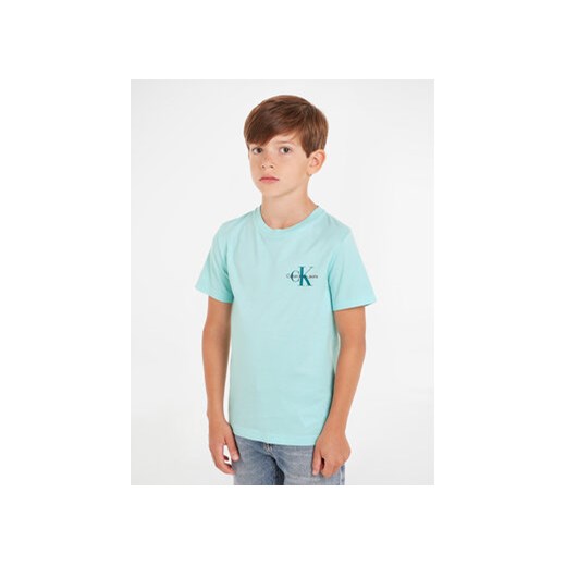 Calvin Klein Jeans T-Shirt Monogram IB0IB01231 D Niebieski Regular Fit ze sklepu MODIVO w kategorii T-shirty chłopięce - zdjęcie 169844142