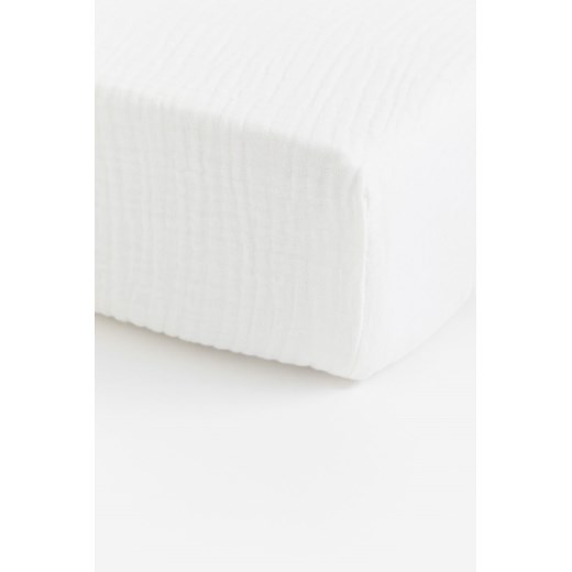 H & M - Muślinowe prześcieradło z gumką do łóżeczka - Biały ze sklepu H&M w kategorii Prześcieradła - zdjęcie 169882730