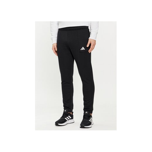 adidas Spodnie dresowe Pump Workout IT4310 Czarny Regular Fit ze sklepu MODIVO w kategorii Spodnie męskie - zdjęcie 169895994