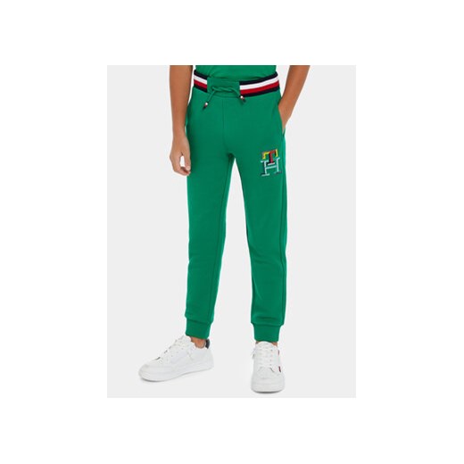 Tommy Hilfiger Spodnie dresowe Monogram KB0KB08836 Zielony Regular Fit ze sklepu MODIVO w kategorii Spodnie chłopięce - zdjęcie 169974271