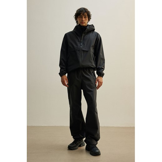 H & M - Spodnie przeciwdeszczowe StormMove Unisex - Czarny ze sklepu H&M w kategorii Spodnie męskie - zdjęcie 170040231