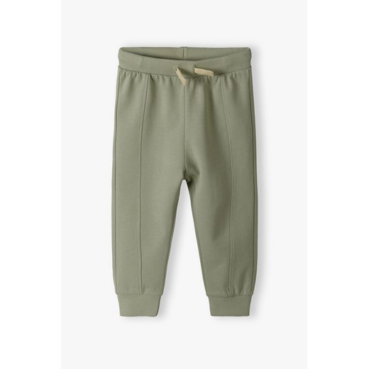 Zielone bawełniane spodnie dresowe dla niemowlaka - 5.10.15. ze sklepu 5.10.15 w kategorii Spodnie i półśpiochy - zdjęcie 170154574