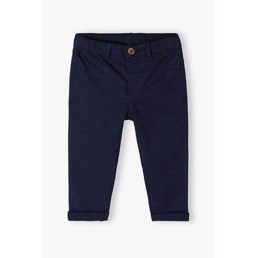 Granatowe eleganckie spodnie dla niemowlaka - 5.10.15. ze sklepu 5.10.15 w kategorii Spodnie i półśpiochy - zdjęcie 170154632
