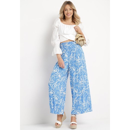 Niebieskie Wiskozowe Spodnie Szerokie we Florystyczny Wzór Seridwen ze sklepu Born2be Odzież w kategorii Spodnie damskie - zdjęcie 170184550