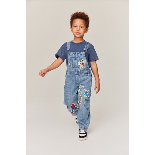 H & M - Dżinsowe spodnie ogrodniczki z aplikacjami - Niebieski H & M 128 (7-8Y) H&M