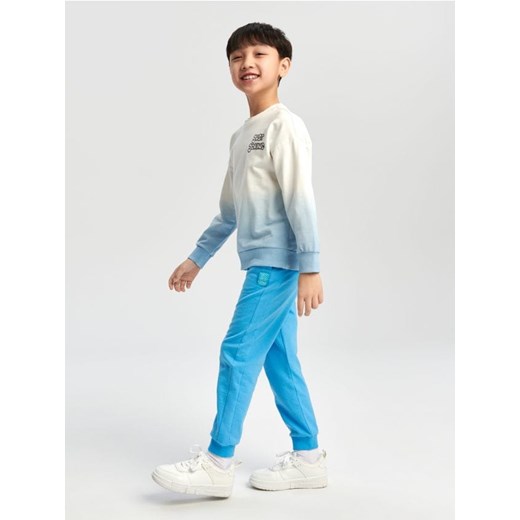 Sinsay - Spodnie dresowe jogger - mid blue ze sklepu Sinsay w kategorii Spodnie chłopięce - zdjęcie 170217274