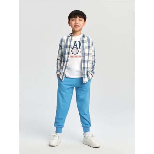 Sinsay - Spodnie dresowe jogger - mid blue ze sklepu Sinsay w kategorii Spodnie chłopięce - zdjęcie 170217302