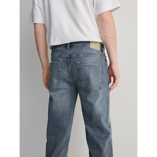 Reserved - Jeansy slim z efektem sprania - jasnoszary Reserved 32 Reserved