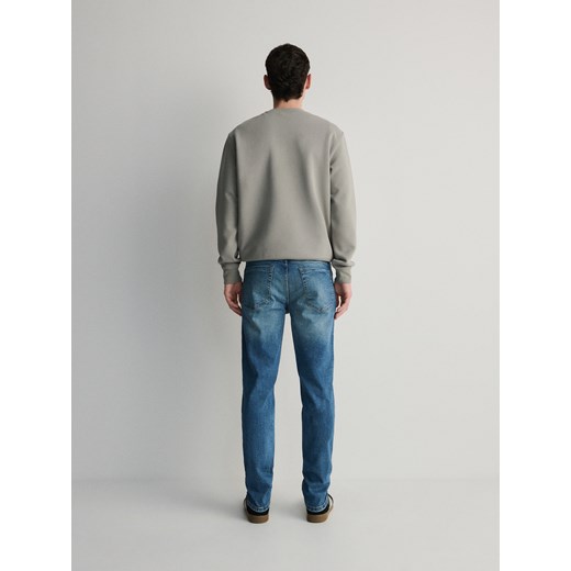 Reserved - Jeansy slim z efektem sprania - indigo jeans Reserved 34 Reserved