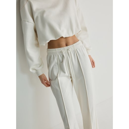 Reserved - Spodnie z szerokimi nogawkami - złamana biel ze sklepu Reserved w kategorii Spodnie damskie - zdjęcie 170257942
