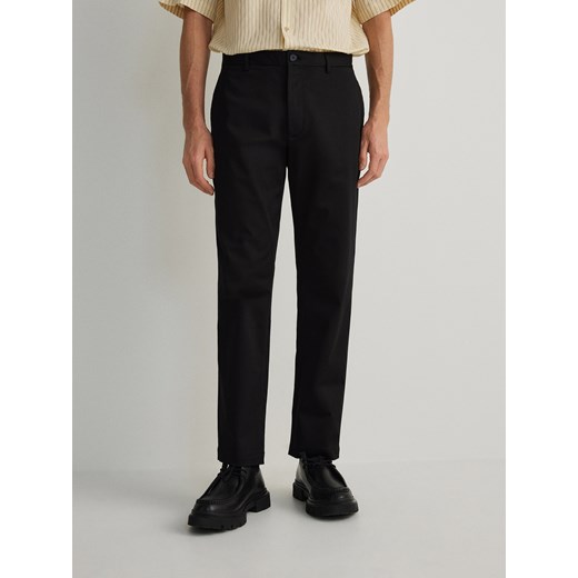 Reserved - Spodnie chino leisure fit - czarny Reserved 29 Reserved